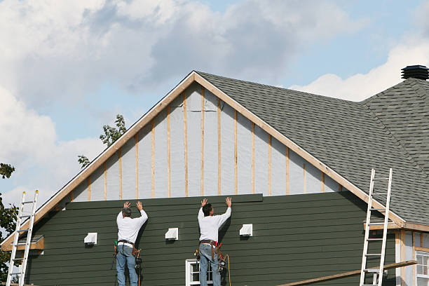 Professional Siding Replacement technician working in Plainville, CT